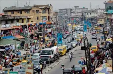  ?? PHOTO: EPA ?? The commercial centre in downtown Ikeja, Lagos. The city has gradually shed its ‘dystopian’ reputation and is now regarded as a much cleaner, safer place.