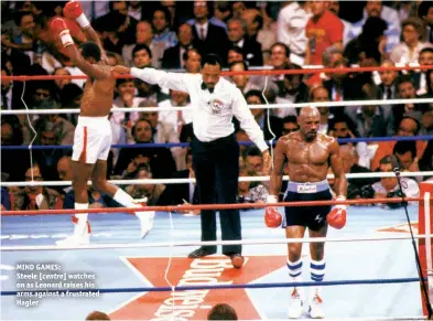  ?? Photo: USA TODAY SPORT ?? MIND GAMES: Steele [centre] watches on as Leonard raises his arms against a frustrated Hagler