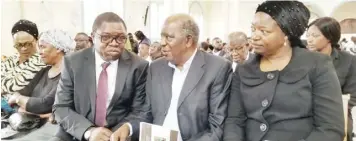  ??  ?? Foreign Affairs Minister Joseph Malanji (Left) with former Finance Minister Alexander Chikwanda (centre) and 1st Deputy Speaker Catherine Mugala during the funeral Mass for the late Mr Chibesakun­da at St. Ignatius Catholic Parish in Lusaka yesterday.