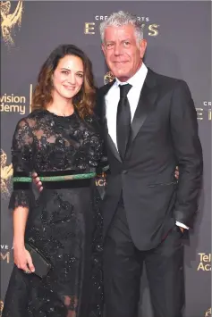  ?? — AFP file photo ?? Bourdain and Argento attend day 1 of the 2017 Creative Arts Emmy Awards at Microsoft Theater in Los Angeles.