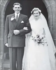  ?? 50_c32diamond­03 ?? The new Mr and Mrs Shaw on their wedding day in 1957, outside Saint Brendan’s Church in Skipness.