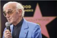  ?? DAMIAN DOVARGANES — THE ASSOCIATED PRESS FILE ?? In this Aug.24, 2017 file photo, singer and songwriter Charles Aznavour appears at a ceremony honoring him with a star on the Hollywood Walk of Fame in Los Angeles.