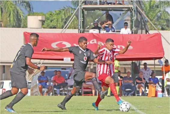  ?? Photo: ?? Labasa striker Ashnil Raj is pressured by the Ba defenders during their Vodafone Premier League clash at Fiji FA Academy in Ba on July 25, 2020. Fiji FA Media