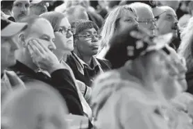  ?? KIM HAIRSTON/BALTIMORE SUN ?? Estella Yellowdy of Park Heights, middle, listens to a panel discussion at the Orioles’ annual FanFest at the Baltimore Convention Center last year. FanFest will be held Jan. 26.