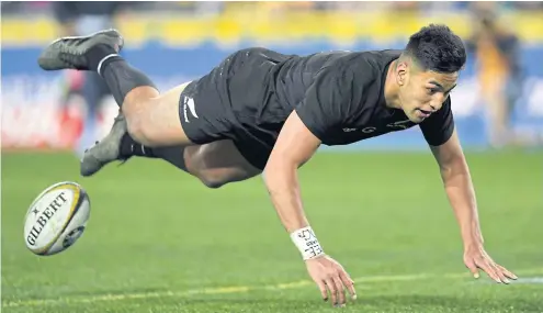  ??  ?? All Blacks winger Rieko Ioane scores one of his two tries.