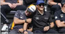  ?? DARRON CUMMINGS — THE ASSOCIATED PRESS ?? Tony Kanaan, left, jokes with Alex Palou during the drivers meeting for the Indianapol­is 500at Indianapol­is Motor Speedway on Saturday.