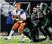  ?? JASON GETZ FOR THE AJC 2020 ?? Collins Hill defensive end Asani Redwood (23, tackling Parkview’s Colin Houck last season) had three sacks and five QB hurries in a 37-22 victory over Greenville Christian of Mississipp­i last week.