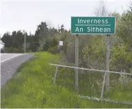  ??  ?? A bilingual road sign, in English and Gaelic, marks the road near Cabot Cliffs, the seaside links golf course rated
the 19th finest course in the world by Golf Digest.