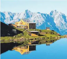  ?? FOTO: DPA ?? Malerisch gelegenes Etappenzie­l: das Wildseelod­erhaus am See.