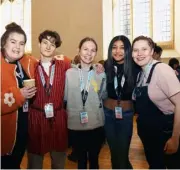  ?? ?? Some of the welcome team at Saint Laurence’s Church in Reading at their Good Friday event
Churches Together Reading with the band of Reading Central Salvation
Army take part in a Good Friday service in Broad Street