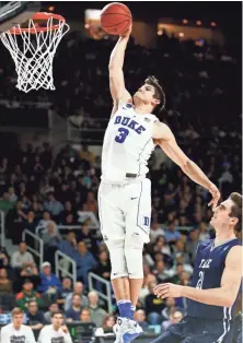  ?? MARK L. BAER, USA TODAY SPORTS ?? Four highly ranked freshmen join junior Grayson Allen, dunking March 19, on a loaded Duke team.