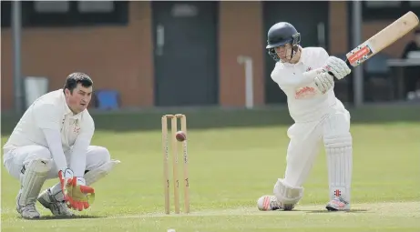  ??  ?? Joe Spalding bats for Peterlee against Hylton on Saturday, with keeper Liam Foster preparing to gather. Pictures by Tim Richardson.