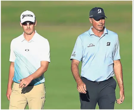  ?? — AFP ?? The leaders: Andrew Putnam (left) trails leader Matt Kuchar (right) by two strokes after the third round of the Sony Open in Hawaii at the Waialae Country Club in Honolulu on Saturday.