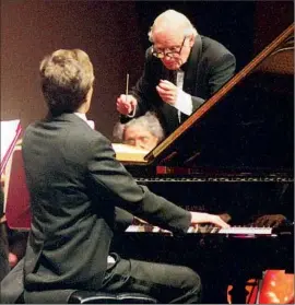  ?? Ben Swets ?? MAESTRO Alvin Mills conducts pianist John Novacek in 2001. His f inal concert will be May 15 at University Synagogue in Brentwood.