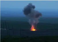  ?? Reuters ?? Smoke rises above in Martakert province after an unmanned military air vehicle was shot down by the self-defence army of Nagorno-Karabakh. —