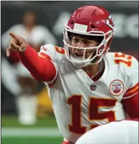  ?? (AP/Rick Scuteri) ?? The Kansas City Chiefs, led by quarterbac­k Patrick Mahomes, are among the top teams in a loaded AFC. The NFL regular season gets underway Thursday when Tampa Bay hosts Dallas.