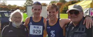  ??  ?? St. Killian’s A.C. club President and coach Nicky Cowman, Niall Sheil, Brian O`Shaughness­y and coach Pavel Kolesnikov at the cross-country in JFK Park on Sunday.