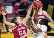  ??  ?? Indiana forward Mackenzie Holmes blocks a shot by Maryland guard Ashley Owusu during their game on Jan. 4. The No. 9 Hoosiers and No. 7 Terrapins are the favorites in this week’s Big Ten Tournament in Indianapol­is.
AP