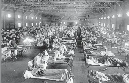  ?? U.S. NATIONAL GUARD BUREAU ?? Soldiers in quarantine while recovering from the Spanish flu, at Camp Funston, Kansas in 1918.
