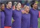  ?? CHRISTOPHE­R HANEWINCKE­L/USA TODAY SPORTS ?? Canada players wear “enough is enough” shirts during the national anthem on Feb. 19.