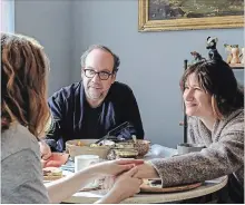  ?? JOJO WHILDEN NETFLIX ?? Kayli Carter, left, with Paul Giamatti and Kathryn Hahn, who play a couple going through IVF in "Private Life."