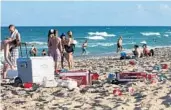  ?? STAFF FILE PHOTO ?? Police can’t ask a person to open a cooler, so city officials might try to keep beer off the beach by banning coolers.