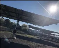  ?? PHOTO COURTESY OF LANSDALE ELECTRIC ?? The sun shines above newly installed solar panels at the Lansdale Borough utility complex on Ninth Street.