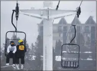  ?? ?? Participan­t Mercedes Wolff (left) chats with volunteer Joel Kennet on Dec. 29 while riding the explorer chairlift at Big Sky Resort.