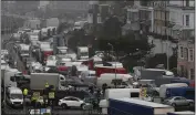  ?? FRANK AUGSTEIN — THE ASSOCIATED PRESS ?? Vehicles wait at the entrance to the Port of Dover in Dover, England, Wednesday.