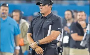  ?? [MIKE MCCARN/THE ASSOCIATED PRESS] ?? Panthers head coach Ron Rivera watches during the first half against the Buccaneers on Sept. 12 in Charlotte, N.C.