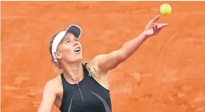  ?? Picture: Getty. ?? Caroline Wozniacki serves against Pauline Parmentier.