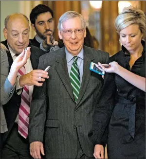  ?? AP/J. SCOTT APPLEWHITE ?? Senate Majority Leader Mitch McConnell leaves the chamber after announcing the release of the Senate Republican­s’ health care bill Thursday at the Capitol in Washington.