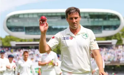  ??  ?? Tim Murtagh leaves the field with the ball. Photograph: Andrew Fosker/BPI/REX/Shuttersto­ck