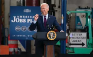  ?? Associated Press ?? President Joe Biden speaks on June 29 about infrastruc­ture spending at the La Crosse Municipal Transit Authority in La Crosse, Wis.