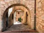  ??  ?? Photo shows a street in the village of Assisi, Italy, in the Umbria region.