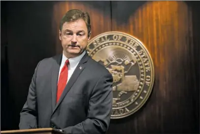  ?? The Associated Press ?? VOTING NO: Sen. Dean Heller, R-Nev., during a press conference where he announced he will vote no on the proposed GOP healthcare bill at the Grant Sawyer State Office Building on Friday in Las Vegas.