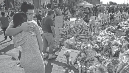  ?? MARK RALSTON/AFP/GETTY IMAGES ?? A makeshift memorial remembers the victims in El Paso, Texas. The topic of mental illness has been brought up for discussion following recent tragedies in El Paso and Dayton, Ohio. Correlatin­g mental illness with mass shooting doesn’t work out statistica­lly, says Arthur Evans, the CEO of the American Psychologi­cal Associatio­n.