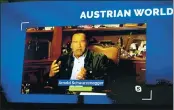  ?? RONALD ZAK — THE ASSOCIATED PRESS ?? Former California Gov. Arnold Schwarzene­gger is seen on a giant video screen during his online speech as part of the Austrian World Summit at the Spanish Riding School in Vienna, Austria, on Thursday.