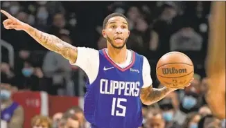  ?? Mark J. Terrill Associated Press ?? THE PLAY OF Xavier Moon, 27, has impressed Clippers acting coach Brian Shaw, who said the NBA call-up “belongs in this league.” COVID-related issues are giving Moon that opportunit­y.