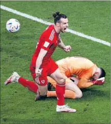  ?? Adrian Dennis AFP via Getty Images ?? BALE BEGINS his celebratio­n after beating goalie Matt Turner. Bale, an LAFC forward, nearly scored in stoppage time as well.