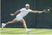  ?? REUTERS ?? Rafael Nadal hits a forehand return during practice.