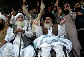  ?? AFP ?? The head of Tehreek-e-Labaik Pakistan, Khadim Hussain Rizvi, attends a protest against the court decision to overturn the conviction of Asia Bibi in Lahore on Wednesday. —