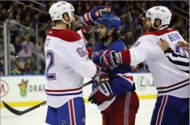  ?? GETTY IMAGES FILE PHOTO ?? Steve Ott of the Montreal Canadiens taps Mats Zuccarello of the New York Rangers on the head during Game 6 of their first-round NHL playoff series.