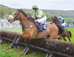  ??  ?? ‘I was thinking “don’t fall”, but he winged it’ — Katie Sinclair puts a tumble in her first race ride behind her as Moscow Chancer triumphs