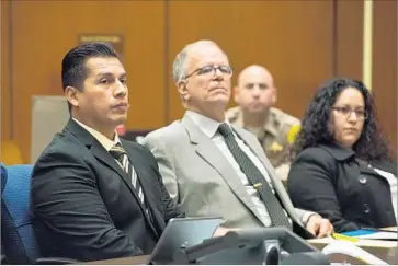  ?? Michael Owen Baker For The Times ?? LOS ANGELES Police Department officers Rene Ponce, left, and Irene Gomez, right, listen to testimony with Gomez’s defense attorney Ira Salman during a preliminar­y hearing in January.