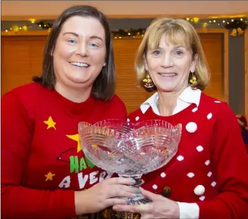  ??  ?? Adeline Foxe, New Ross ladies’ player of the year, with Marguerite Sutton (lady Captain).