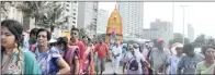  ??  ?? LEFT: Devotees pulling a chariot.