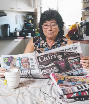  ??  ?? MORNING RITUAL: Earlville retiree Heather Eric Swaffer has had the Cairns Post delivered to her home for the past 45 years and doesn’t start her day without reading it. Picture: BRENDAN RADKE