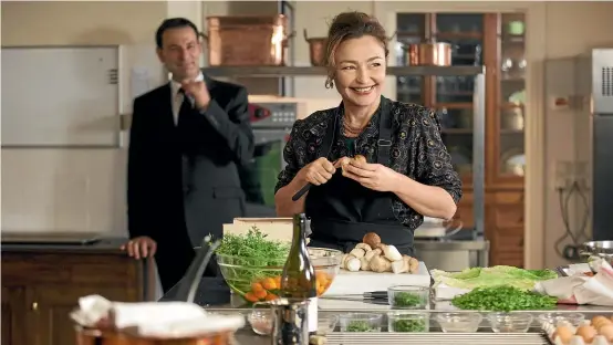  ??  ?? Catherine Frot plays a fictionali­sed version of renowned French chef Daniele Mazet-Delpeuch in Haute Cuisine.