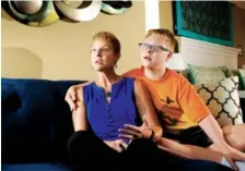  ?? STAFF PHOTO BY TIM BARBER ?? Deborah Rausch talks about special education while sitting next to her son, Luka Hyde, at their home Friday.